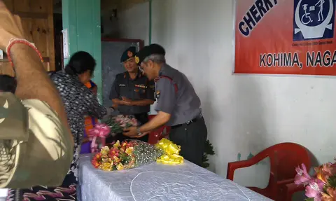 BRIG MONISH RECEIVES THE BOUQUET